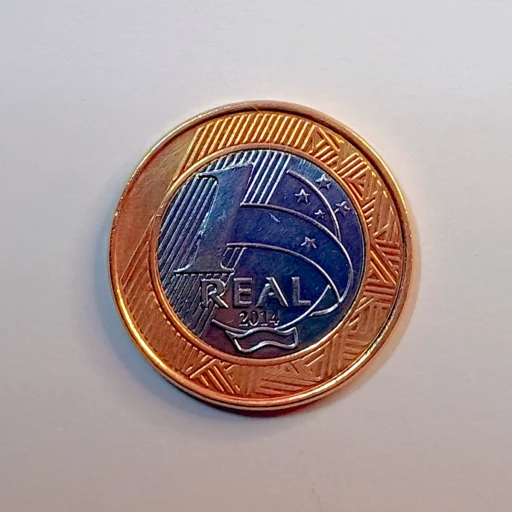 A Grande Mentira da Escassez moeda de 1 Real 2014 reverso
