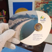 Blister Moeda Entrega da Bandeira Olímpica 1 Real 2012 em oferta